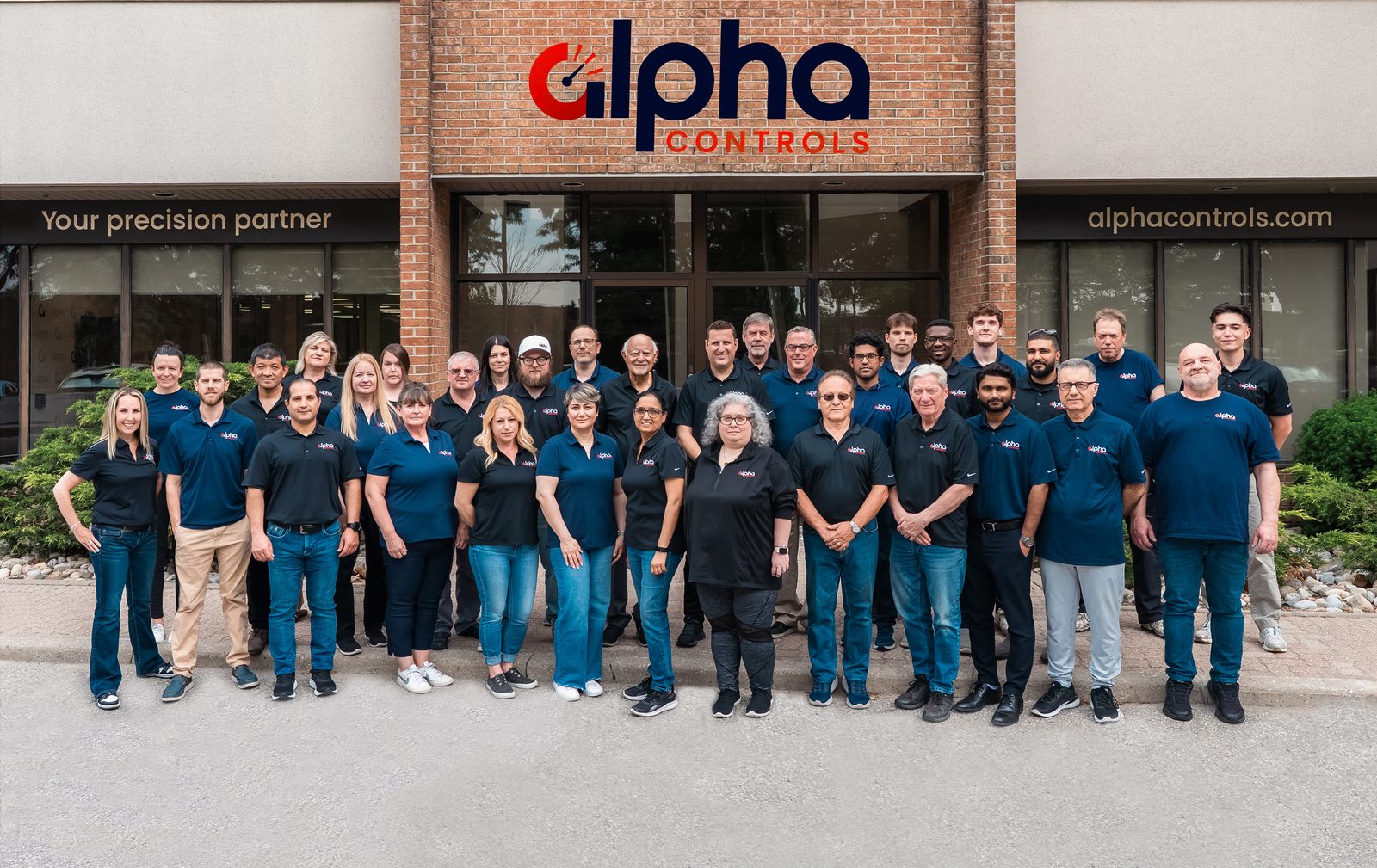 Alpha Controls full team outside headquarters