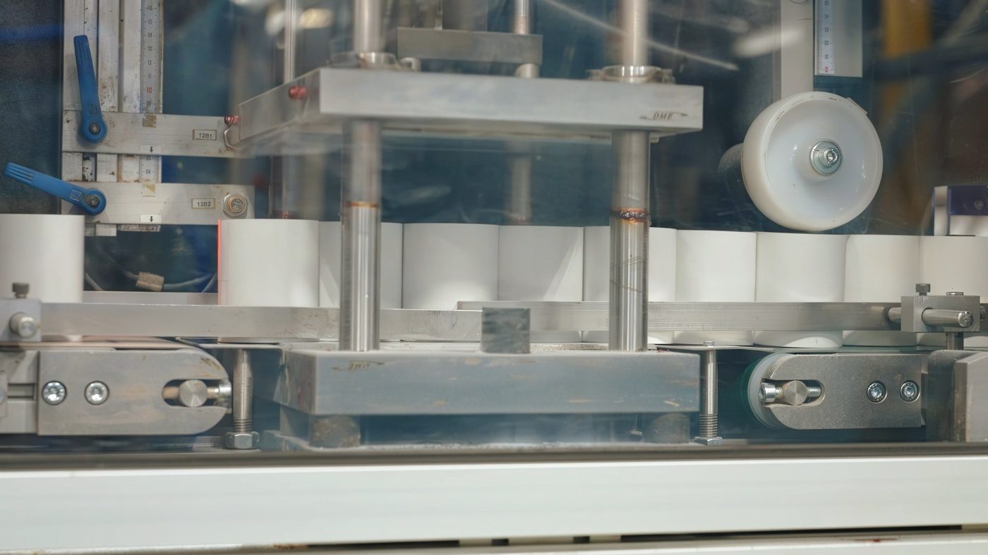 Close-up of cutting and packaging machinery