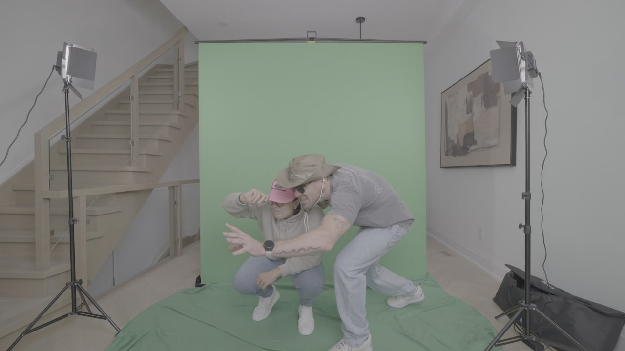 Green screen plate with both talents crouching